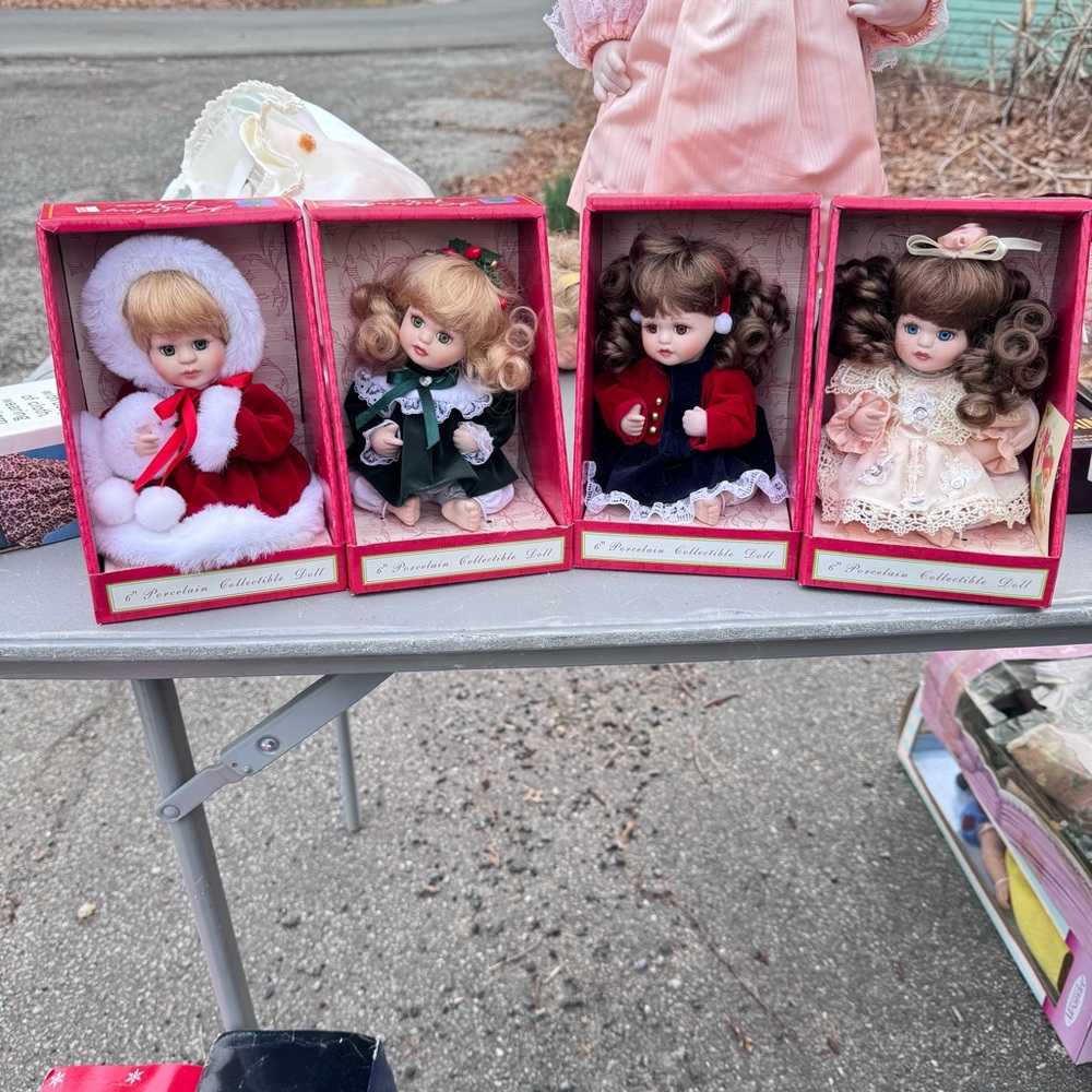 Set of 4 miniature Collectible porcelain dolls